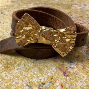 Anthropologie belt with gold bow buckle